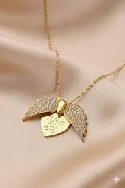 Expanding Wing Heart Locket Necklace